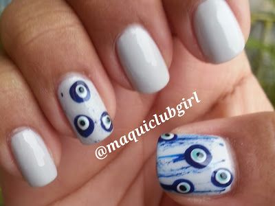 diseno-de-unas-en-color-blanco-con-ojitos-3