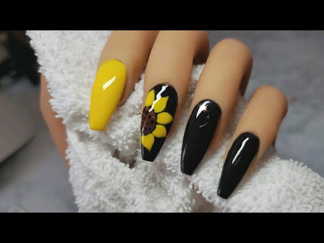 diseno-de-unas-negras-con-girasoles-5