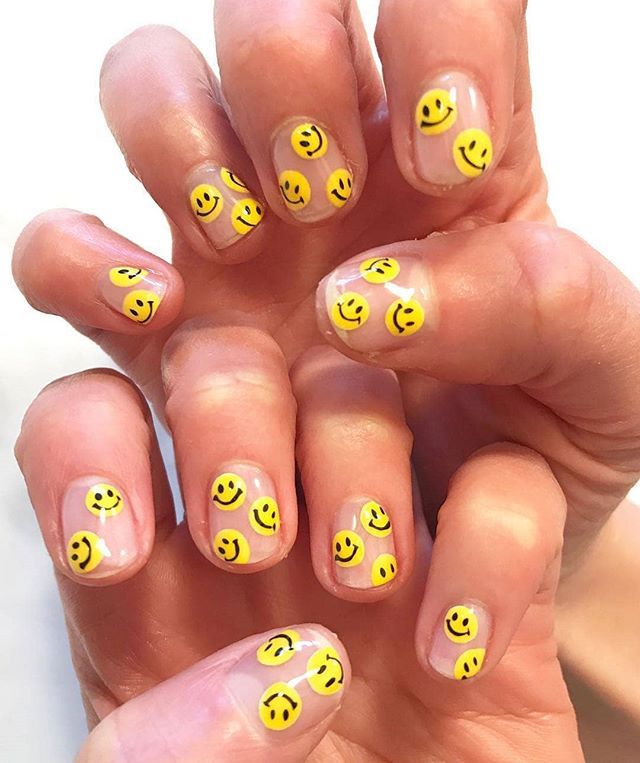 disenos-de-caritas-unas-naranja-5