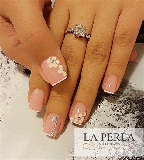 disenos-de-de-unas-color-naranja-con-piedras-y-perlas-3
