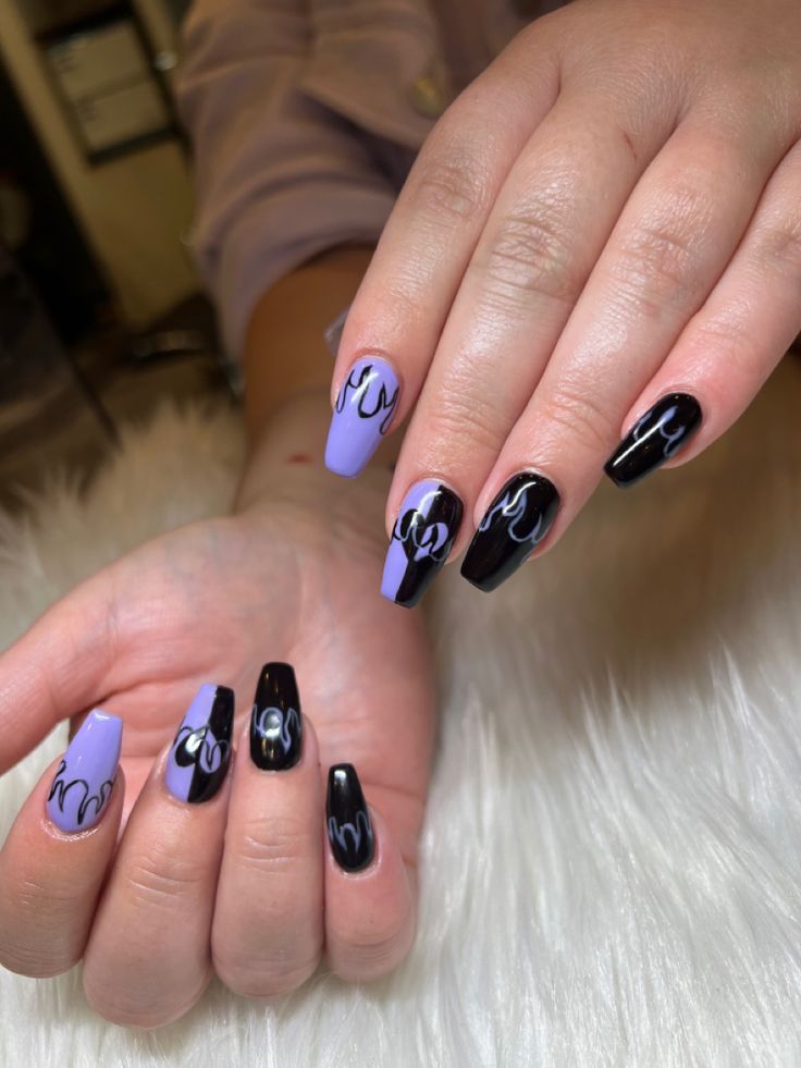 imagenes-de-unas-disenos-morado-con-negro-2