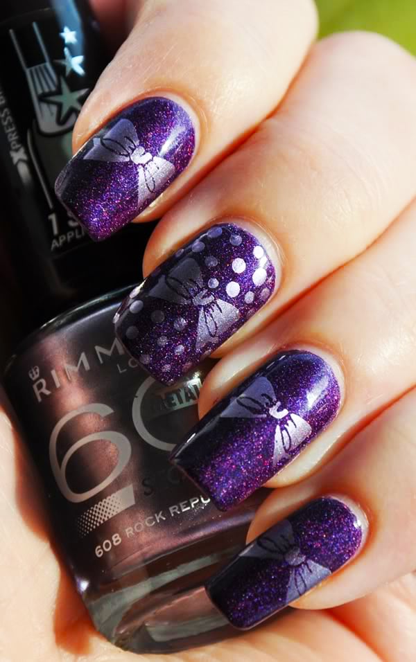 imagenes-de-unas-disenos-morado-con-negro-7